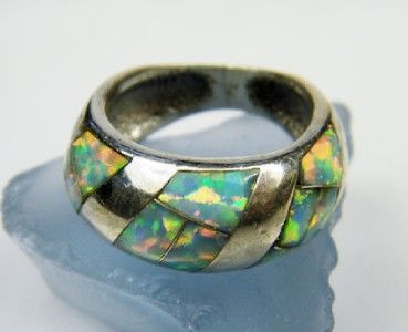 IN THIS AUCTION a pre owned unsigned sterling silver and opal inlaid 