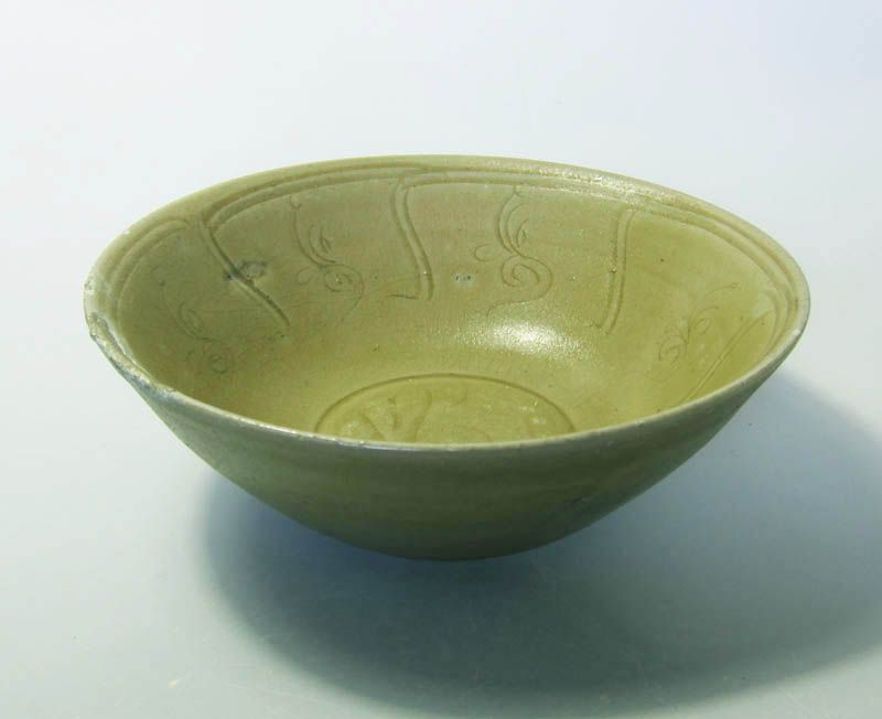   condition but with minor glaze degradation and restored shallow chip